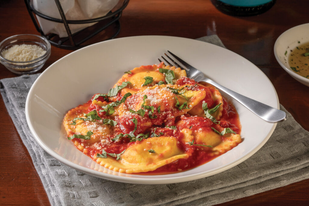 Cheese ravioli in a white bowl