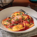 Cheese ravioli in a white bowl