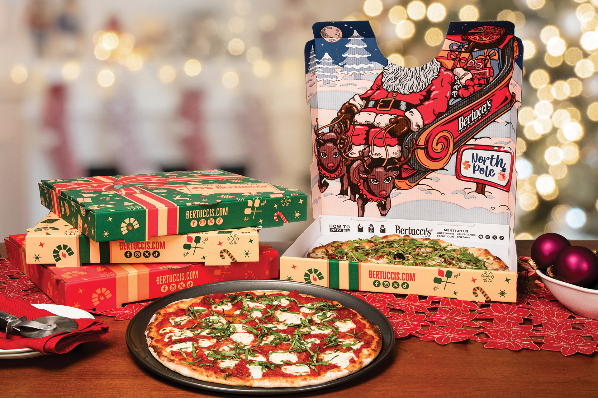Bertucci's pizzas in holiday boxes with printed bibs for taking fun photos with your family