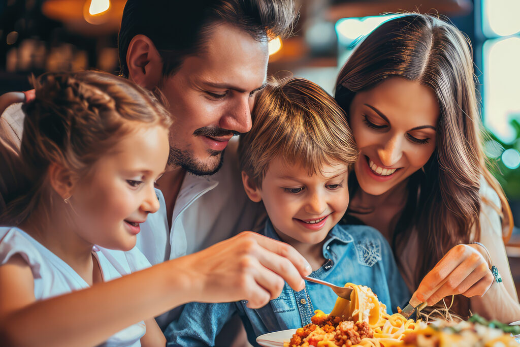 A family eating pasta together at Bertucci's
