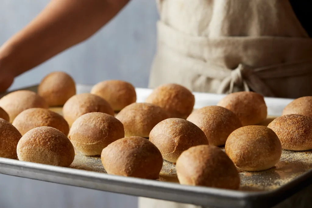 Fresh-baked Bertucci’s rolls served on a tray and ready to enjoy.