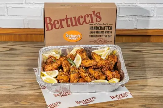 A catering tray of Tuscan Chicken Wings